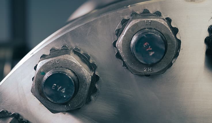 A flange showing multiple HYTORC Washers installed