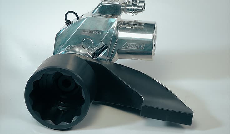 An AVANTI Hydraulic Torque Wrench with attached coaxial reaction arm and socket.