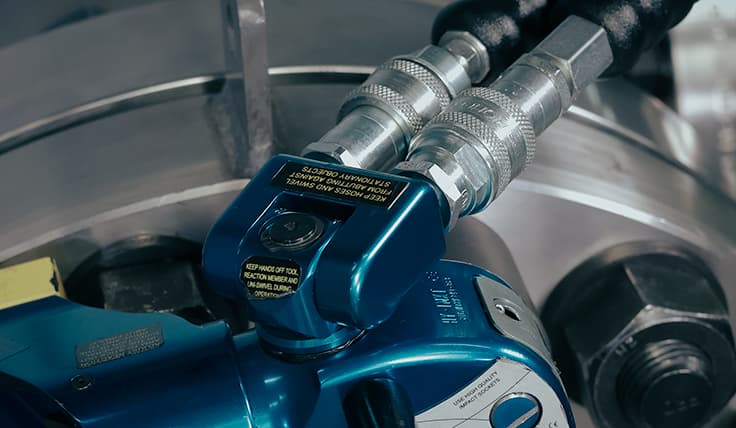 A close-up of the MXT Hydraulic Torque Wrench showing the 360°x120° Uniswivel