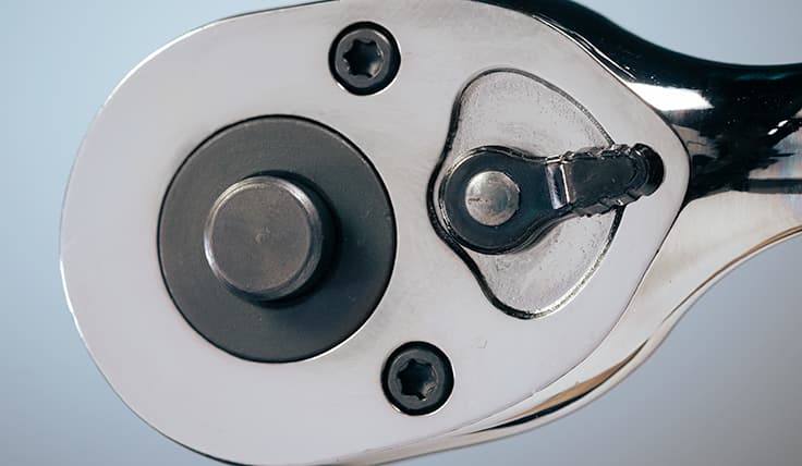 A close-up of the Quick Release Button on a HYTORC Clicker Wrench.