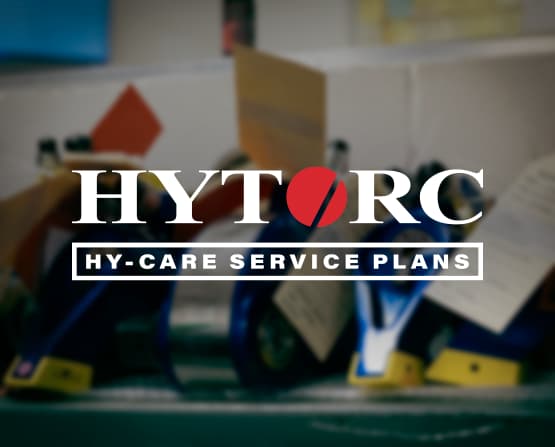 A graphic showing the HYTORC HY-CARE service plans logo with MXT+ Hydraulic Torque Wrenches in the background