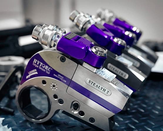 A collection of HYTORC Stealth Hydraulic Torque Wrenches on a table