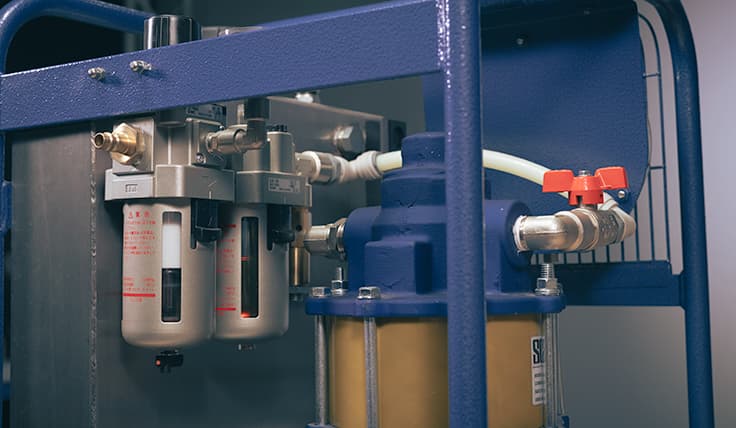A close-up of the built-in FRL on the Pneumatic Tensioning Pump