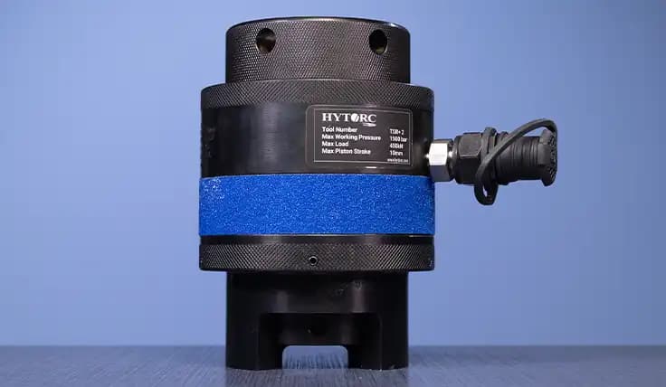 An AVANTI Hydraulic Torque Wrench with attached coaxial reaction arm and socket.
