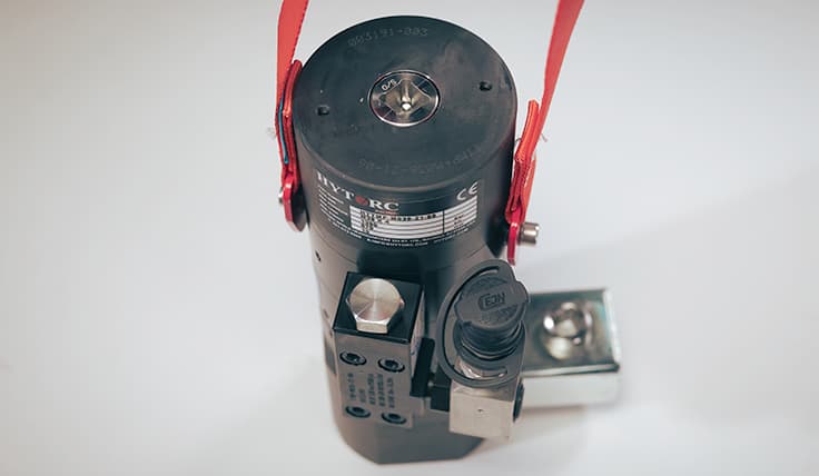 An AVANTI Hydraulic Torque Wrench with attached coaxial reaction arm and socket.