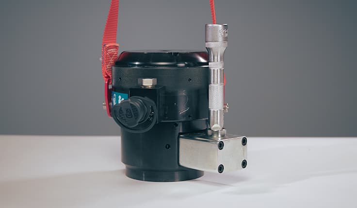 An AVANTI Hydraulic Torque Wrench with attached coaxial reaction arm and socket.